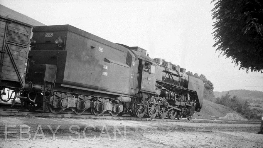 s-l1600 y JZ Loco 11-057 pulling freight c1960.jpg