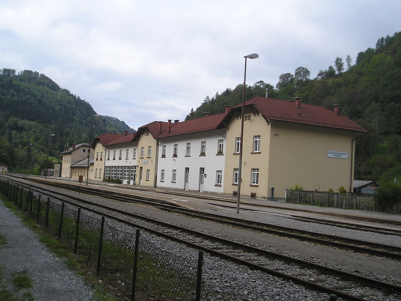 1280px-Podbrdo-train_station.jpg